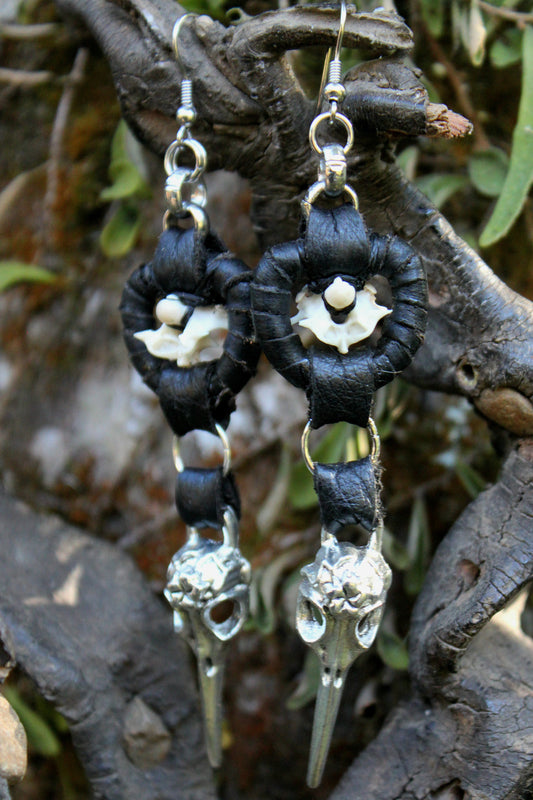 Raven and serpent statement earrings