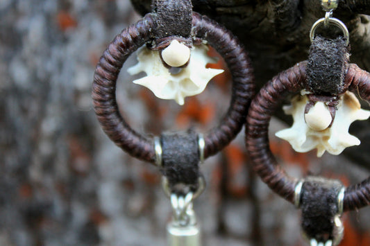 Procupine and serpent earrings