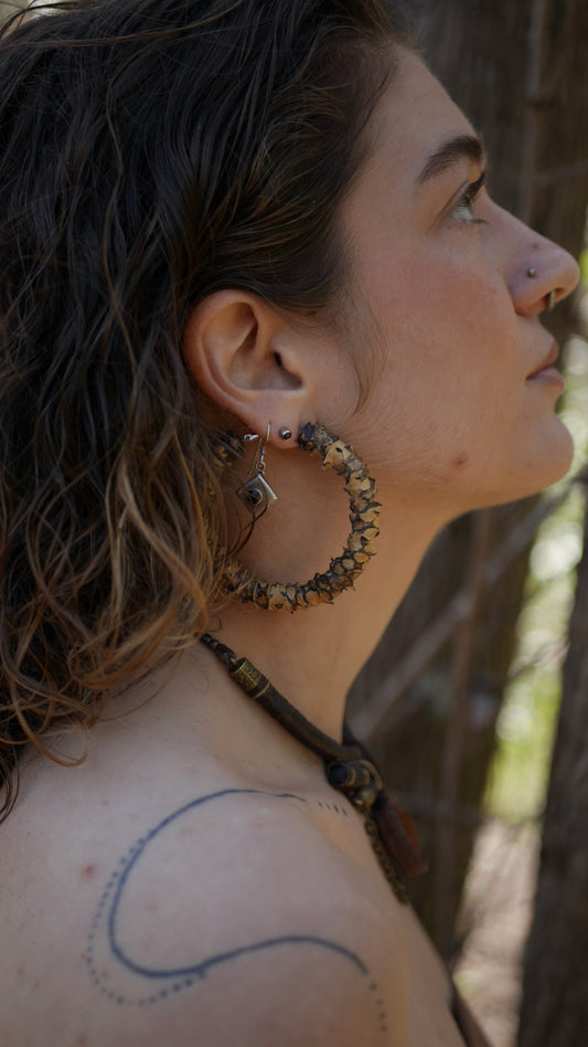 Yellow serpent hoops