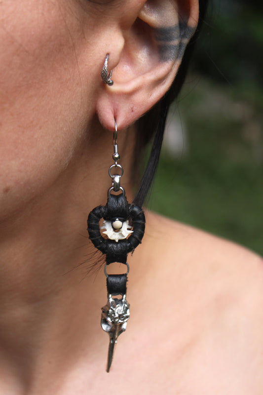Raven and serpent statement earrings