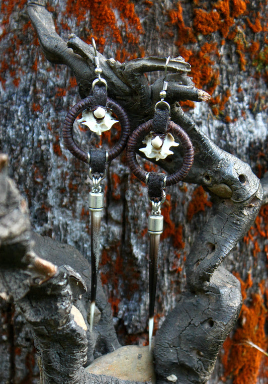 Procupine and serpent earrings